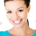 woman pointing at smile2